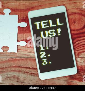 Text caption presenting Tell Us. Business approach communicate information to someone in spoken or written words Stock Photo