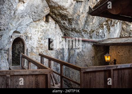 PREDJAMA, SLOVENIA - October 02, 2022 - Famous medieval cave castle in Predjama, Slovenia Stock Photo