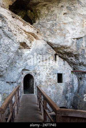 PREDJAMA, SLOVENIA - October 02, 2022 - Famous medieval cave castle in Predjama, Slovenia Stock Photo