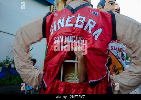 Angono, Rizal, Philippines. 20th Nov, 2022. The parade of the giant puppets in the art capital of the Philippines is back after two years of pandemic. The Higantes (giant) Festival parades the streets of Angono, Rizal province. The paper mache head puppets were originally done to put to shame corrupt officials during the Spanish rulership. Now, the Higantes came a long way and evolve into a festival on modern times from the Spanish era. The festival brings joy and entertainment to the town people of Angono and to tourists. Now, they wear a sash to represent someone or promote something with Stock Photo