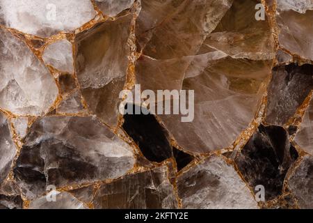 Smoky quartz stones on slab for interior, exterior design decoration, ceramic wall, floor digital tiles. Gemstone background. Matt semi precious Stock Photo