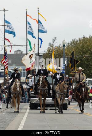 221009-M-VR919-1018 (October 9, 2022) San Francisco Sheriffs ride in on horses during San Francisco Fleet Week 2022 Italian Heritage Parade at San Francisco, California, Oct. 9, 2022. SFFW is an opportunity for the American public to meet their Navy, Marine Corps and Coast Guard teams and experience America’s sea services. During fleet week, service members participate in various community service events, showcase capabilities and equipment to the community, and enjoy the hospitality of the city and its surrounding areas. Stock Photo