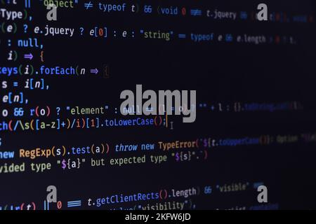 Software developer programming code. Abstract computer script code. Programming code screen of software developer. Software Programming Work Time. Stock Photo