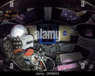 This high-resolution image, taken on November 16, 2022, captures the inside of the Orion crew module on flight day one of the Artemis I mission. At left is Commander Moonikin Campos, a purposeful passenger equipped with sensors to collect data that will help scientists and engineers understand the deep-space environment for future Artemis missions. At the center is the Callisto payload, a technology demonstration of voice-activated audio and video technology from Lockheed Martin in collaboration with Amazon and Cisco. Callisto could assist future astronauts on deep-space missions. Below and to Stock Photo