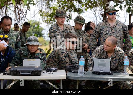 Philippine Marines with 3rd Marine Brigade and U.S. Marines with 11th Marine Expeditionary Unit observe their respective ground control systems for a bi-lateral exchange of small unmanned aerial systems KAMANDAG 6 on Puerto Princesa, Palawan, Philippines, Oct. 10, 2022. KAMANDAG is an annual bi-lateral training exercise between the Armed Forces of the Philippines and U.S. Military designed to strengthen interoperability, capabilities, trust, and cooperation built over decades of shared experiences. Exchange,Marines,drone,reconnaissance,sUAS,small unmanned aerial system, Stock Photo