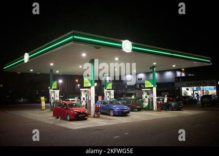 bp garage service station at night with cars refuelling in the uk Stock Photo