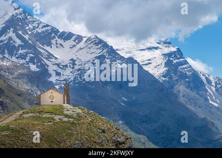 Chapel church above Idyllic Dolomites Alpine landscape, Gran Paradiso, Italy Stock Photo