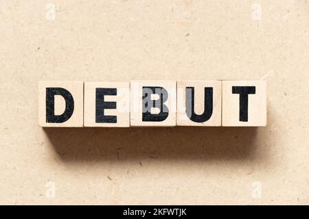 Alphabet letter block in word debut on wood background Stock Photo