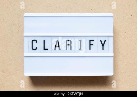 Lightbox with word clarify on wood background Stock Photo