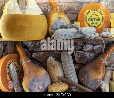 Italian food. Various types of cured meats, speck, sausages, parmesan. Typical Italian products - Merano in South Tyrol - Trentino Alto Adige- norther Stock Photo