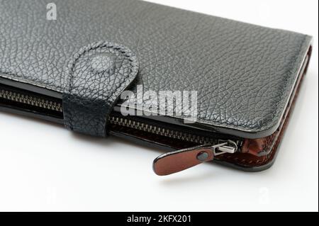 Handmade black leather wallet isolated on studio background Stock Photo