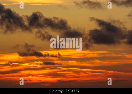 Dramatic colorful sunset sky with clouds. Pylos, Greece. Stock Photo