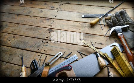 Carpenters Tools on Wooden Work Bench Stock Photo