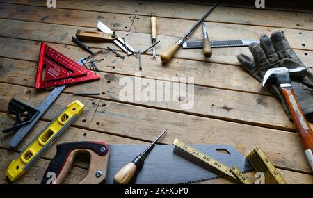 Carpenters Tools on Wooden Work Bench Stock Photo
