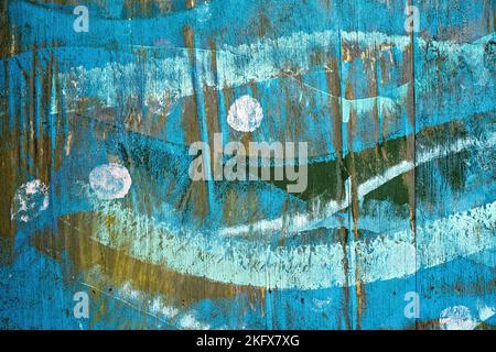 Wave patterns painted on wooden fence Stock Photo