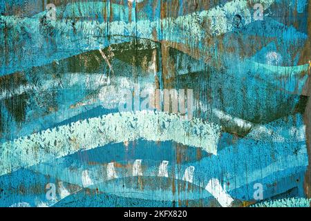 Wave patterns painted on wooden fence Stock Photo