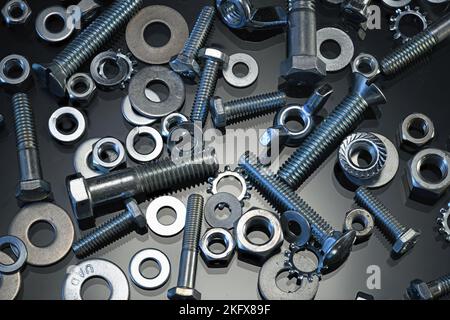 Nuts and Bolts on dark glass Stock Photo