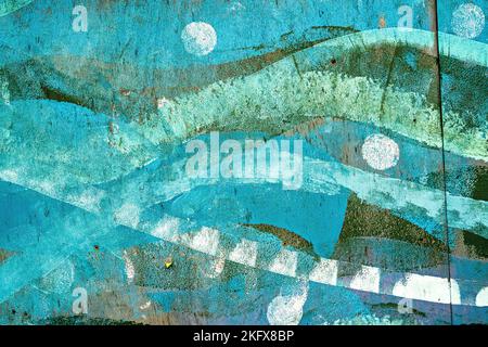Wave patterns painted on wooden fence Stock Photo