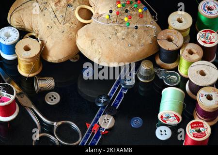 Vintage Sewing Collection on dark background Stock Photo