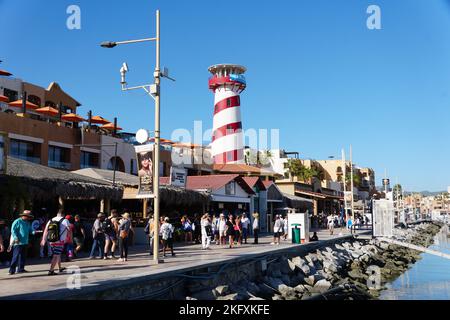 Cabo San Lucas, Mexico - November 7, 2022 - The view of the street and shops and restaurants by the Tequila Lighthouse Stock Photo
