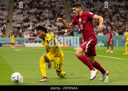 Al Khor, Qatar. November 20, 2022, Al Khor, Al Khor, Qatar, Qatar: AL KHOR, QATAR - NOVEMBER 20: Player of Qatar Karim Boudiaf fights for the ball with player of Ecuador during FIFA World Cup Qatar 2022 group A match between Qatar and Ecuador at Al Bayt Stadium on November 20, 2022 in Al Khor, Qatar. (Credit Image: © Florencia Tan Jun/PX Imagens via ZUMA Press Wire) Credit: ZUMA Press, Inc./Alamy Live News Stock Photo