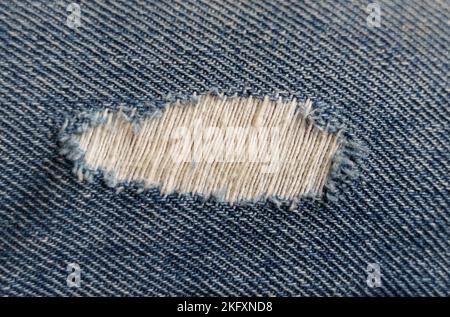Texture. Texture of blue ripped jeans. View from above Stock Photo