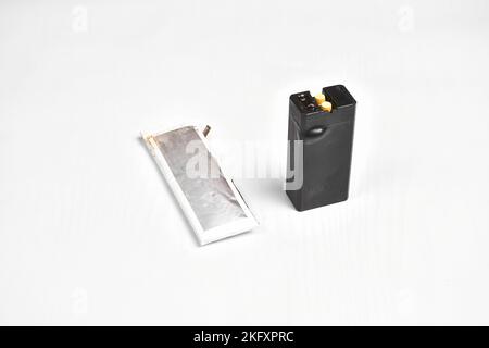 Lithium polymer and lithium ion battery swollen on the white background Stock Photo