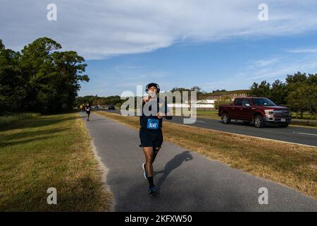 Students and staff members at the Navy Recruiting Orientation Unit (NORU), located on NAS Pensacola, FL, participated in a 5K hosted by the MWR. The event commemorated the Navy's 247th birthday on October 13th, 2022. Stock Photo