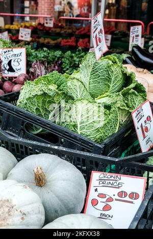 Epsom, Surrey, London UK, November 19 2022, Whole Raw Uncooked Display Of Vegetables On A Market Stall Including Crown Prince Squash Savoy Cabbage Bee Stock Photo