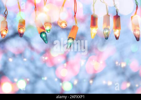 Christmas Lights  - Shiny light bulbs of different colors Stock Photo