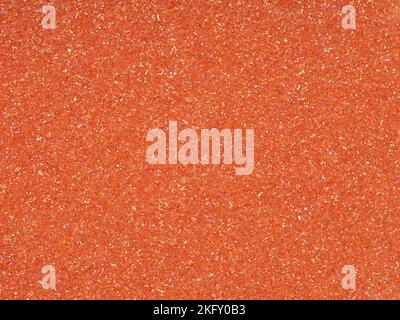 Bright soft orange holographic glitter. Abstract shiny background. Design paper texture for decoration and design of Christmas, New Year, 3d, or other Stock Photo