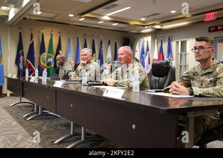 U.S. Air Force Gen. Glen VanHerck (second from left), Commander, North American Aerospace Defense Command and U.S. Northern Command, U.S. Marine Corps Sgt. Maj. James Porterfield (left), NORAD and USNORTHCOM Command Senior Enlisted Leader, Maj. Gen. Randall V. Simmons Jr. (second from right), Commander, Joint Task Force North, and Command Sgt. Maj. Kristopher Dyer (right), Joint Task Force North Command Senior Enlisted Leader, receive a briefing from National Guard senior leaders currently deployed to the Southwest Border in an active-duty status under USNORTHCOM, at Joint Task Force North Hea Stock Photo