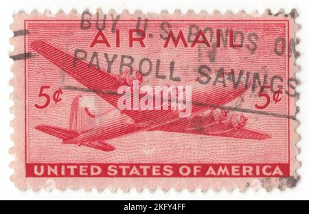 USA - 1946: An 5 cents carmine Air Post stamp depicting DC-4 'Skymaster' mail plane in flight. For prepayment of postage on all mailable matter sent by airmail. The Douglas DC-4 is an American four-engined (piston), propeller-driven airliner developed by the Douglas Aircraft Company. Military versions of the plane, the C-54 and R5D, served during World War II, in the Berlin Airlift and into the 1960s. From 1945, many civil airlines operated the DC-4 worldwide Stock Photo