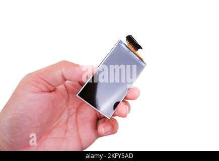 LCD screen for smartphone or small appliances in a hand on white background Stock Photo
