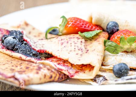 pancake with fruit and marmalade for breakfast and as dessert Stock Photo
