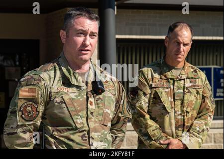 Maj. David Ratte, left, 436th Security Forces Squadron commander, and Col. Matt Husemann, right, 436th Airlift Wing commander, answer questions from mock local media representatives during a simulated press briefing at the conclusion of an active shooter exercise held at the Maj. George S. Welch Elementary and Dover Air Base Middle Schools on Dover Air Force Base, Delaware, Oct. 14, 2022. The exercise involved numerous base and community first responders that worked together to neutralize the simulated active shooter. Stock Photo