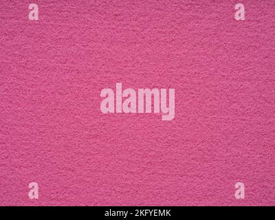 Hot pink felt texture. Saturated background for Christmas desktop, holiday New Year, xmas seasonal decoration, valentin day, text, lettering Stock Photo