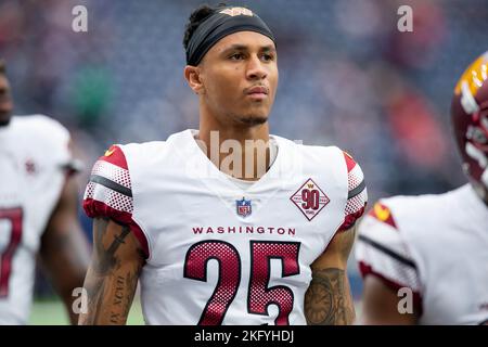 Washington Commanders cornerback Benjamin St-Juste (25) tackles Dallas ...