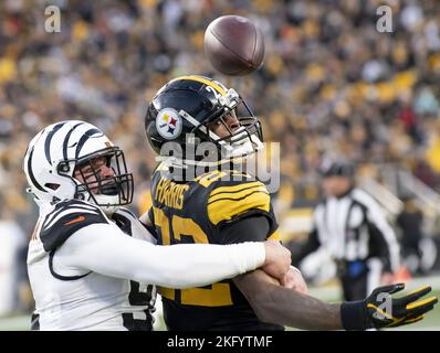 Cincinnati Bengals defensive end Trey Hendrickson (91) is led off the field  after being injured against the Pittsburgh Steelers during the first half  of an NFL football game, Sunday, Nov. 20, 2022