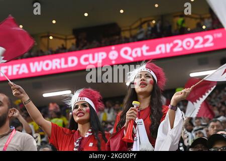 Doha, Katar. 20th Nov, 2022. two young women as female Qatar fans, Soccer fans, Match 1, Group A Qatar - Ecuador 0-2, on 11/20/2022, Al Bayt Stadium. Soccer World Cup 20122 in Qatar from 20.11. - 18.12.2022 ? Credit: dpa/Alamy Live News Stock Photo