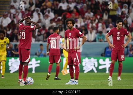 Doha, Katar. 20th Nov, 2022. Player Qataror after versustor, disappointed, frustrated, dejected, action. From left: ALMOEZ ALI (Qatar), HASSAN ALHAYDOS (Qatar), AKRAM AFIF (Qatar), KARIM BOUDIAF (Qatar). Game 1, Group A Qatar - Ecuador, on 20/11/2022, Al Bayt Stadium. Soccer World Cup 20122 in Qatar from 20.11. - 18.12.2022 ? Credit: dpa/Alamy Live News Stock Photo