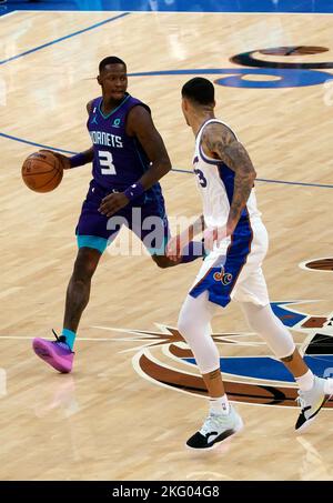 Washington, USA. 20th Nov, 2022. WASHINGTON, DC - NOVEMBER 20: Washington Wizards forward Kyle Kuzma (33) follows Charlotte Hornets guard Terry Rozier (3) during a NBA game between the Washington Wizards and the Charlotte Hornets, on November 20, 2022, at Capital One Arena, in Washington, DC. (Photo by Tony Quinn/SipaUSA) Credit: Sipa USA/Alamy Live News Stock Photo