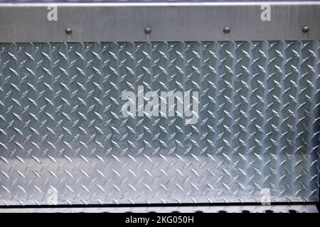 diamond steel plate with rivitted corner steel Stock Photo