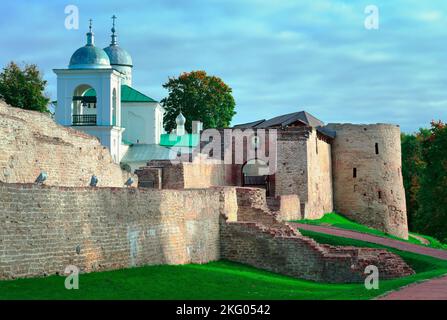 The old stone Izborskaya fortress. Entrance gate on the defensive corridor of the fortress walls, an architectural monument of the XIV-XVII century. I Stock Photo