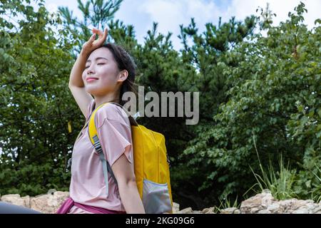 korean young women hiking and plogging  resting Stock Photo