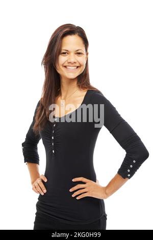 Shes simply glowing with happiness. Studio portrait of an attractive young woman with her hands on her hips isolated on white. Stock Photo