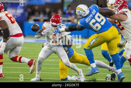 Los Angeles Chargers defensive tackle Sebastian Joseph-Day (69) and  linebacker Troy Reeder (42) tackle Seattle Seahawks quarterback Sean  Mannion (9) in the end zone for a safety during the second half of