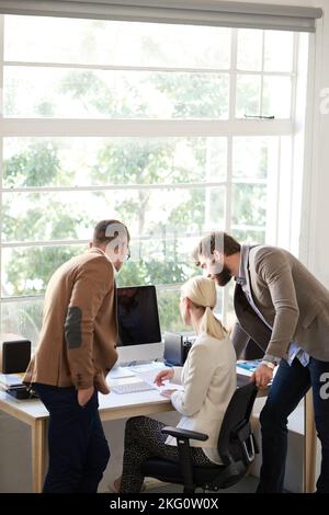 Teamwork and creativity. a group of creative professionals working in an office. Stock Photo