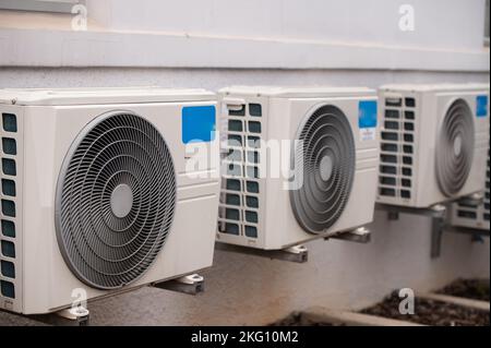 Close up shot of air conditioner mounted on wall Stock Photo