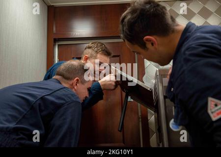 221020-N-JU916-1080 NORFOLK, Va. (Oct. 20, 2022) Sailors clean an icecream machine vent in a wardroom aboard the Nimitz-class aircraft carrier USS Harry S. Truman (CVN 75), October 20, 2022. Truman is the flagship of the Harry S. Truman Carrier Strike Group and is currently in port at Naval Station Norfolk. Stock Photo